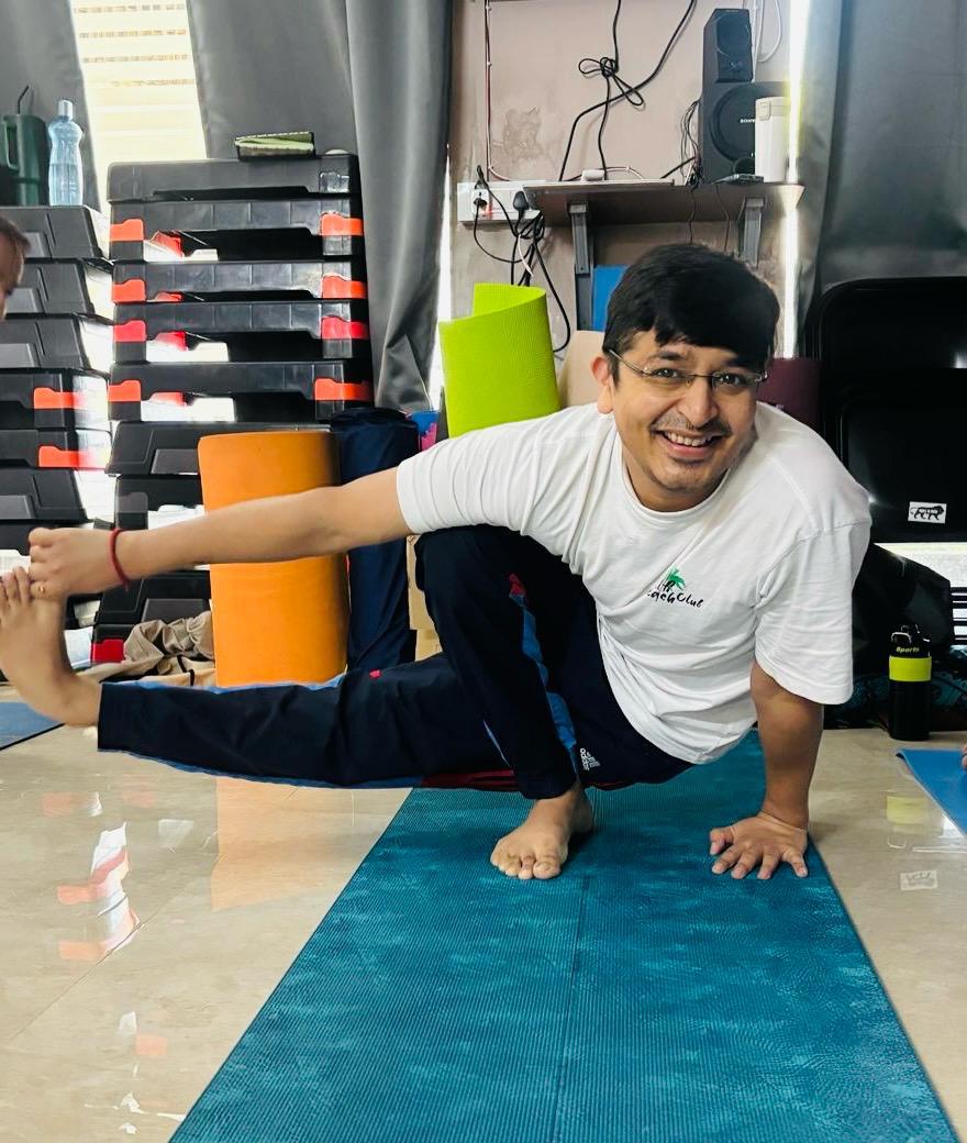 Arpit performing strength and flexibility training during a yoga session at Attmashuddhi
